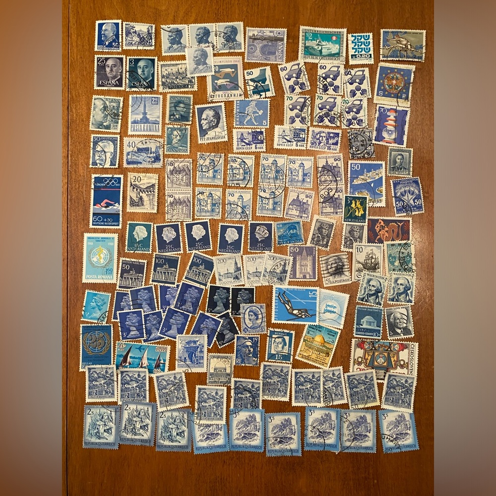 Vintage international & USA Postal Stamps - over 100 postmarked. Blue #2